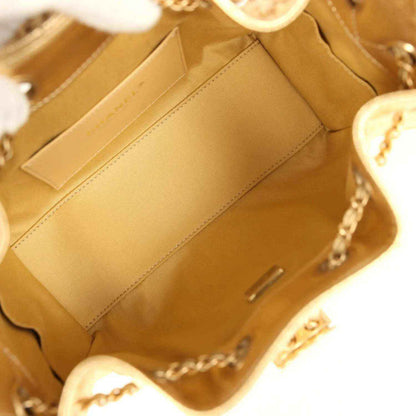 Chanel mini hobo bag interior with stitched pocket and satin-lined base