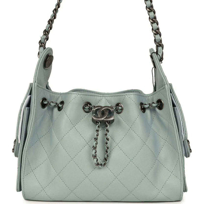 Light blue quilted mini hobo bag with chain shoulder strap and turn-lock hardware