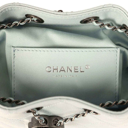 Light blue interior lining with CHANEL logo and stitched pocket opening