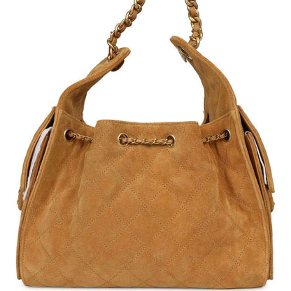 Tan suede hobo bag with antique gold chain handles and drawstring cord closures