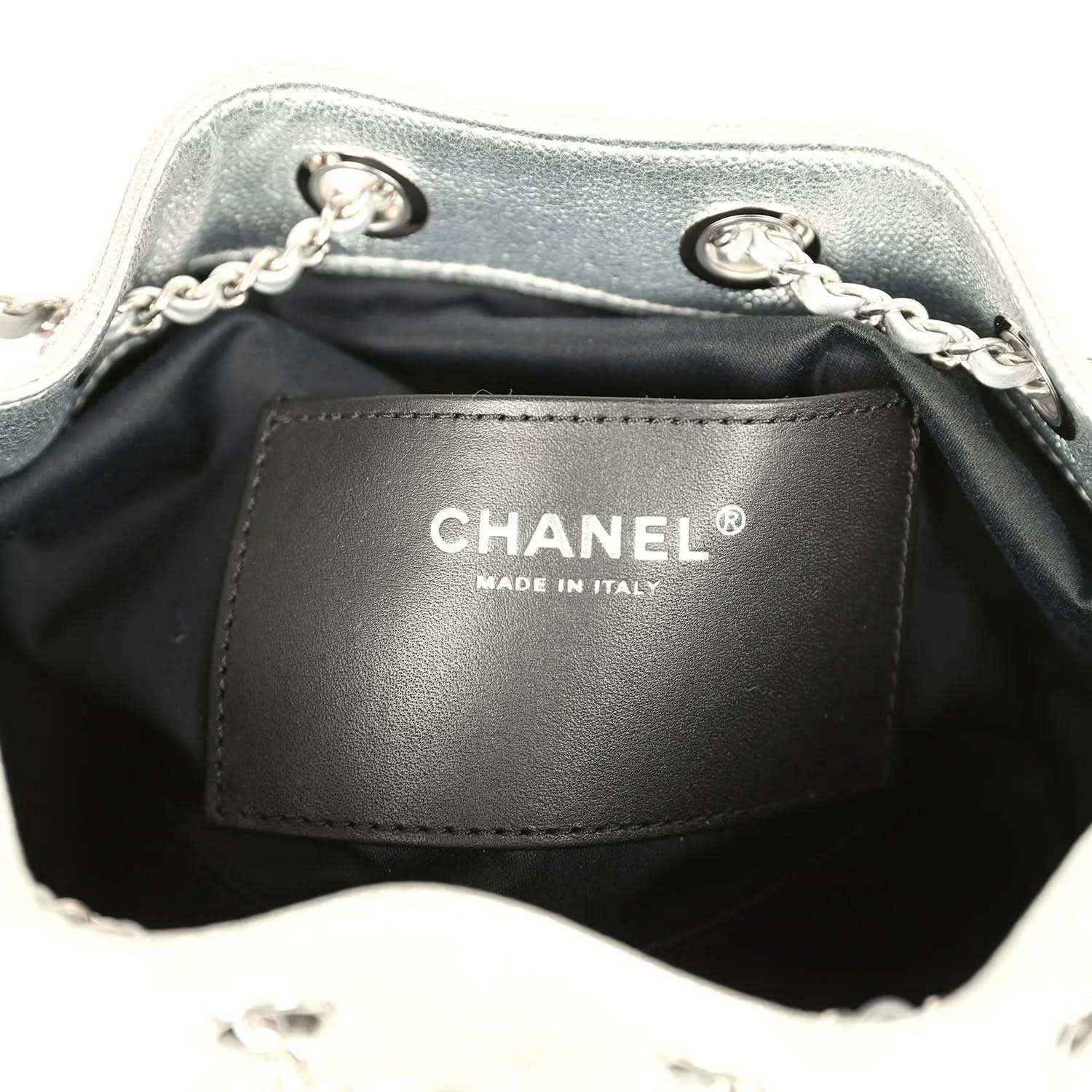Black Chanel® interior label reading CHANEL® and MADE IN ITALY on mini hobo lining