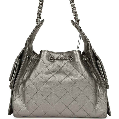 Chanel Small 25 hobo bag front, metallic gray quilted leather, drawstring tie