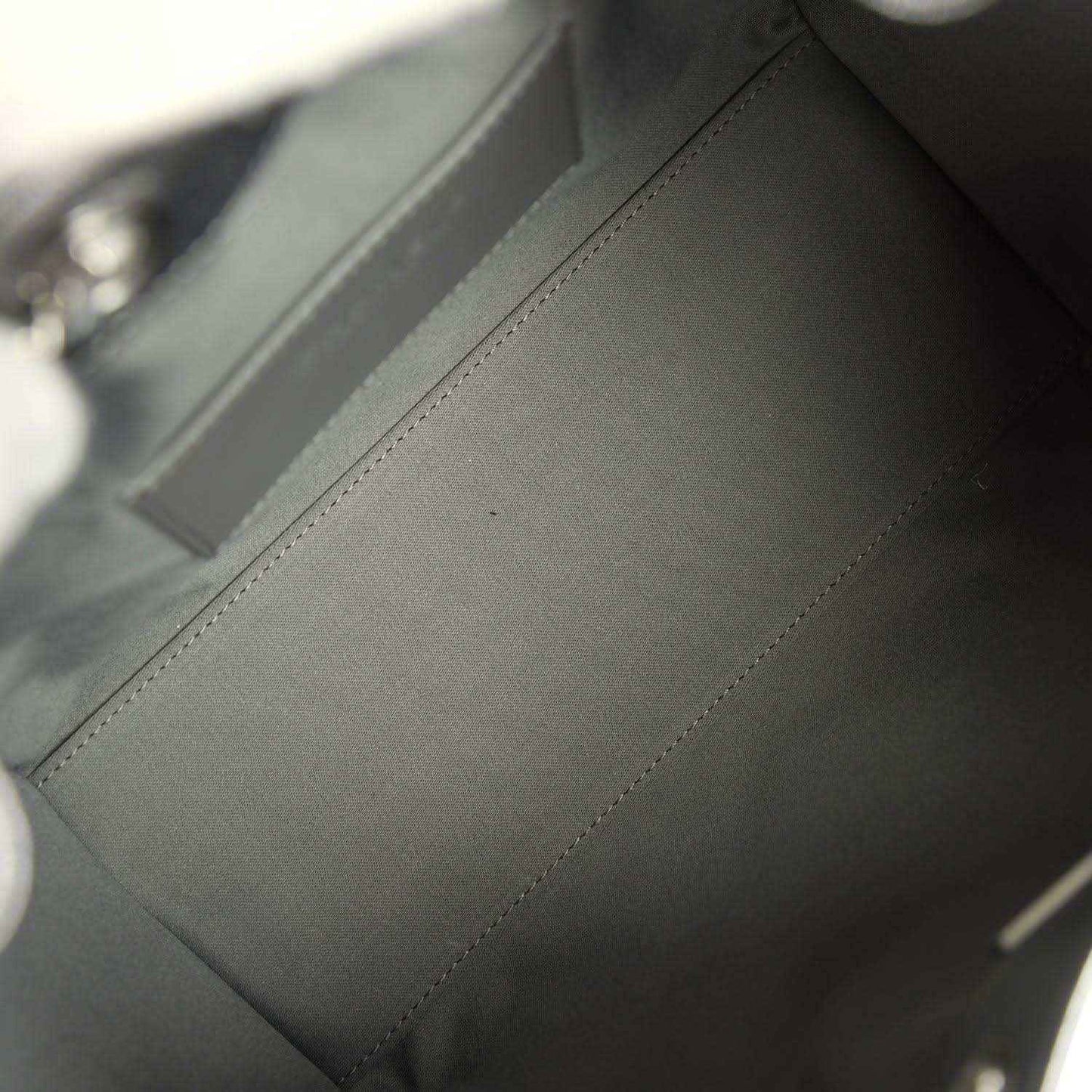 Chanel Small 25 hobo bag lining close-up, metallic gray leather interior panel
