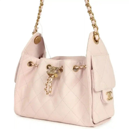 Pink mini hobo bag, logo charm, quilted body and gold chain strap