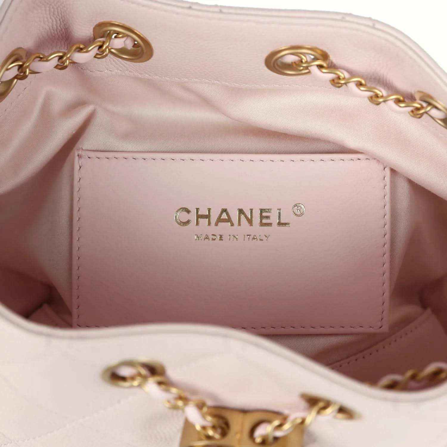 Pink mini hobo bag interior with CHANEL Made in Italy label