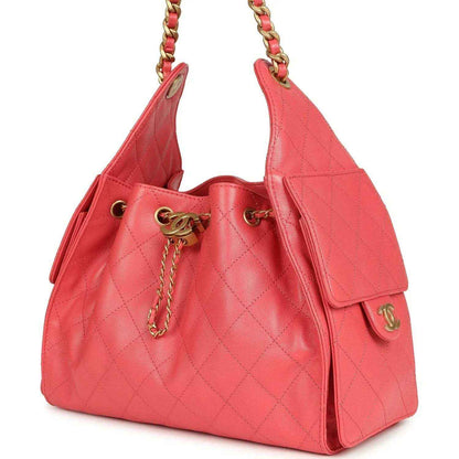 Chanel Small 25 hobo bag, coral pink quilted caviar leather, side tassel and gold charm