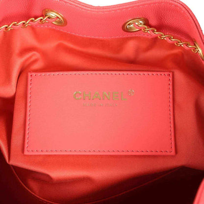 Chanel Small 25 hobo bag interior logo patch on coral pink leather lining