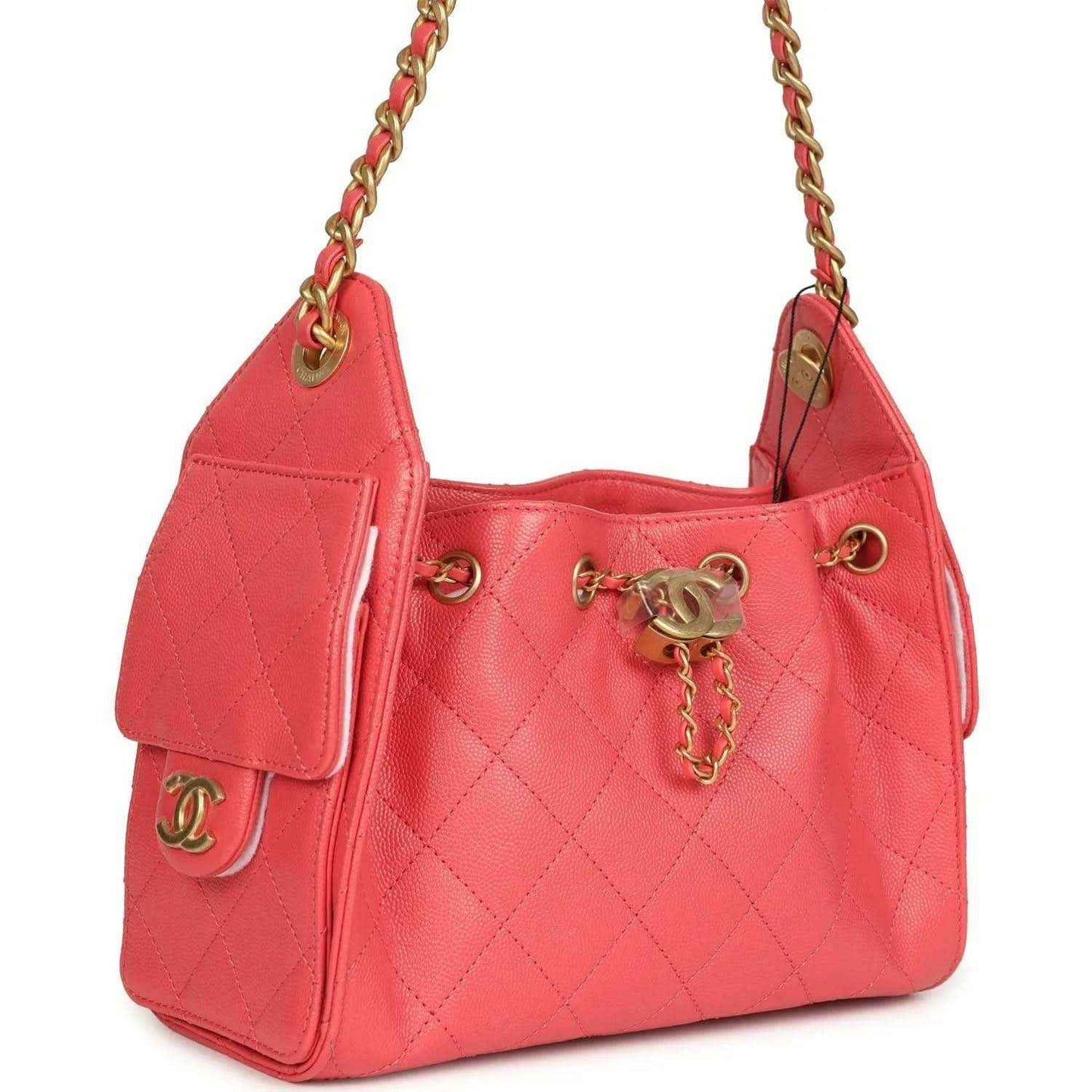 Coral pink quilted mini hobo bag with side flap and gold chain strap