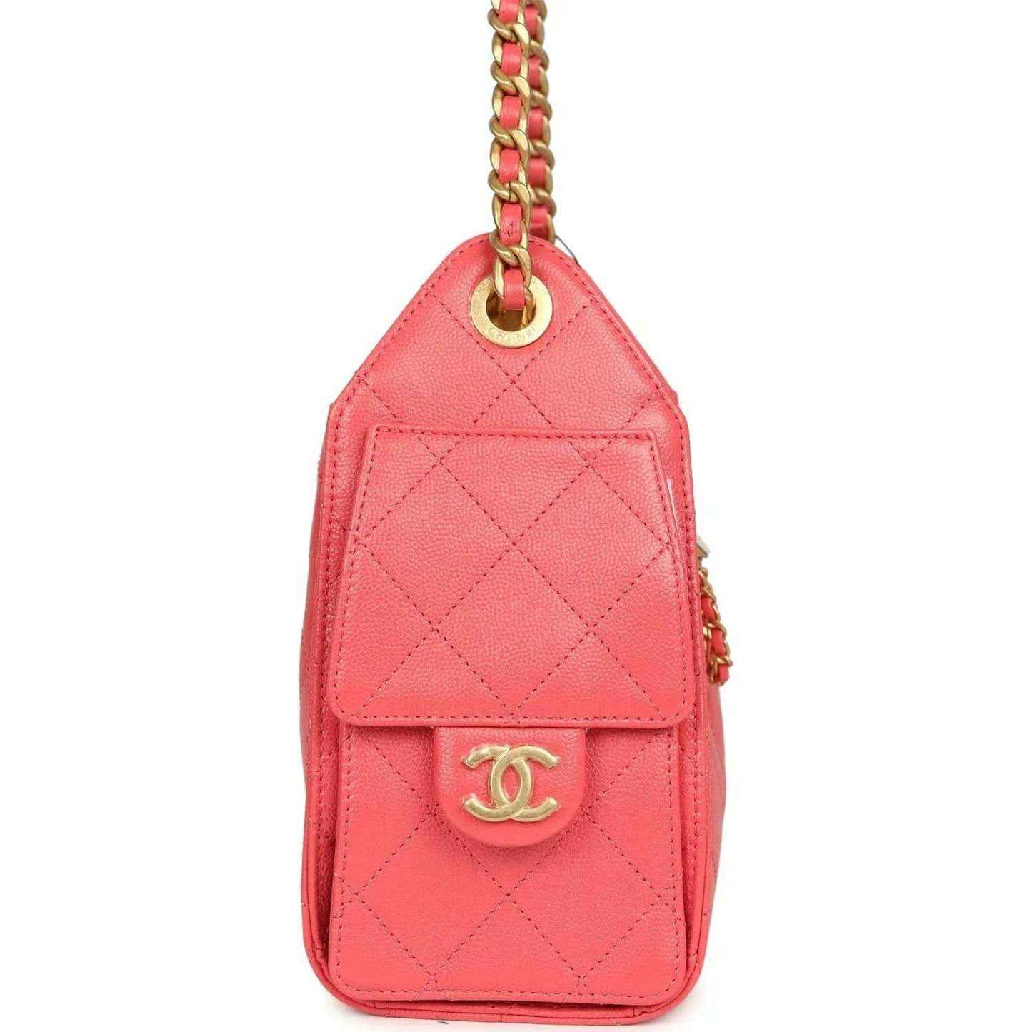 Coral pink quilted mini hobo bag with front flap and gold logo charm