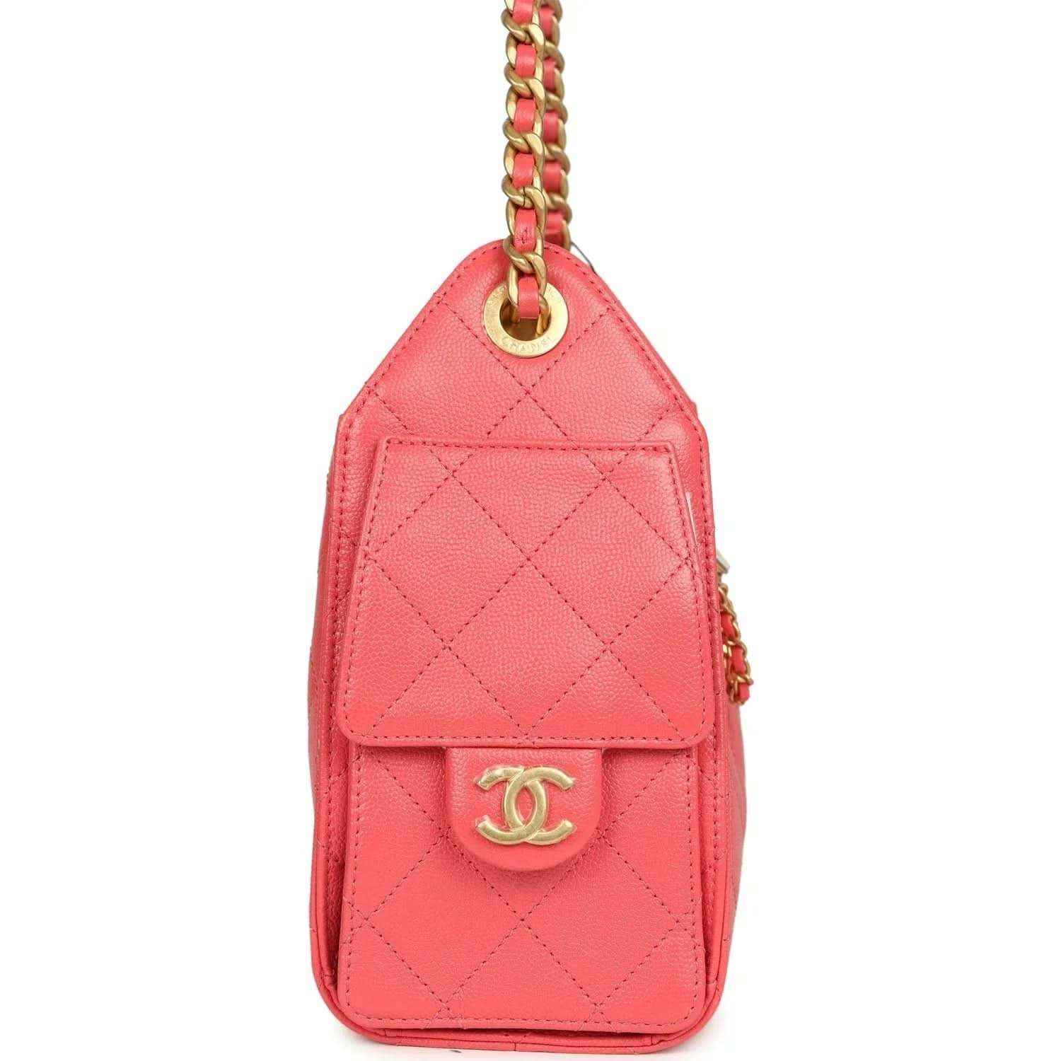 Coral pink quilted mini hobo bag with front flap and gold logo charm