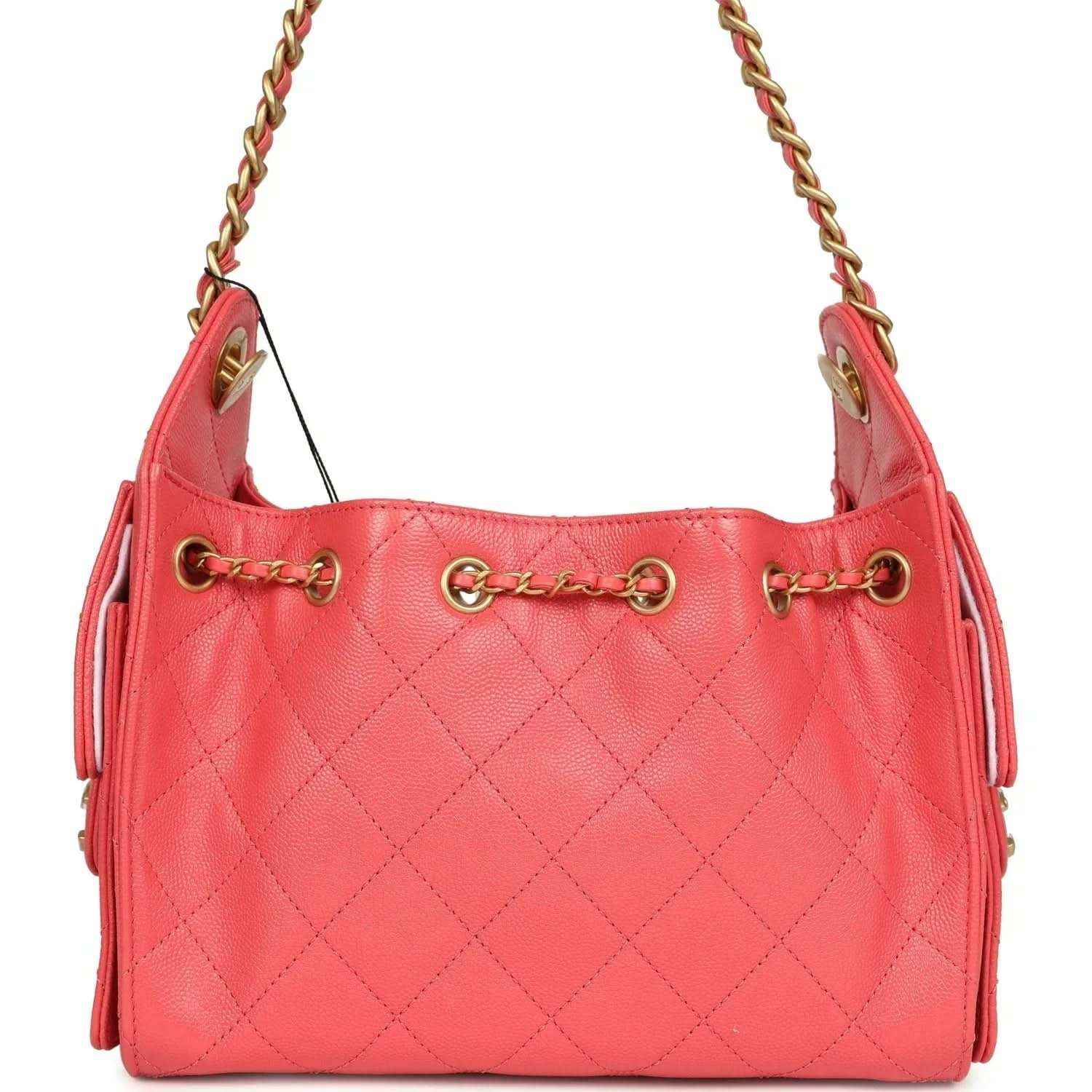 Coral pink quilted mini hobo bag with gold chain handles and open top