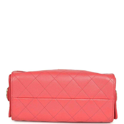Coral pink quilted mini hobo bag with hinged top flap