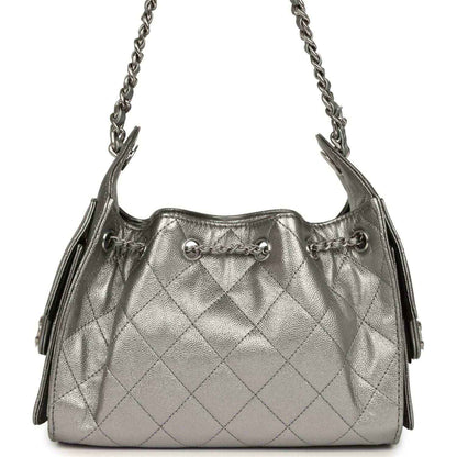Chanel Mini 25 hobo bag front view, metallic quilted finish with drawstring cords and rings