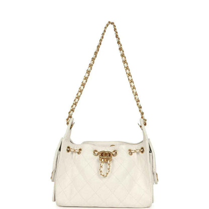 Chanel mini hobo bag in white quilted leather with antique gold chain straps and front charm
