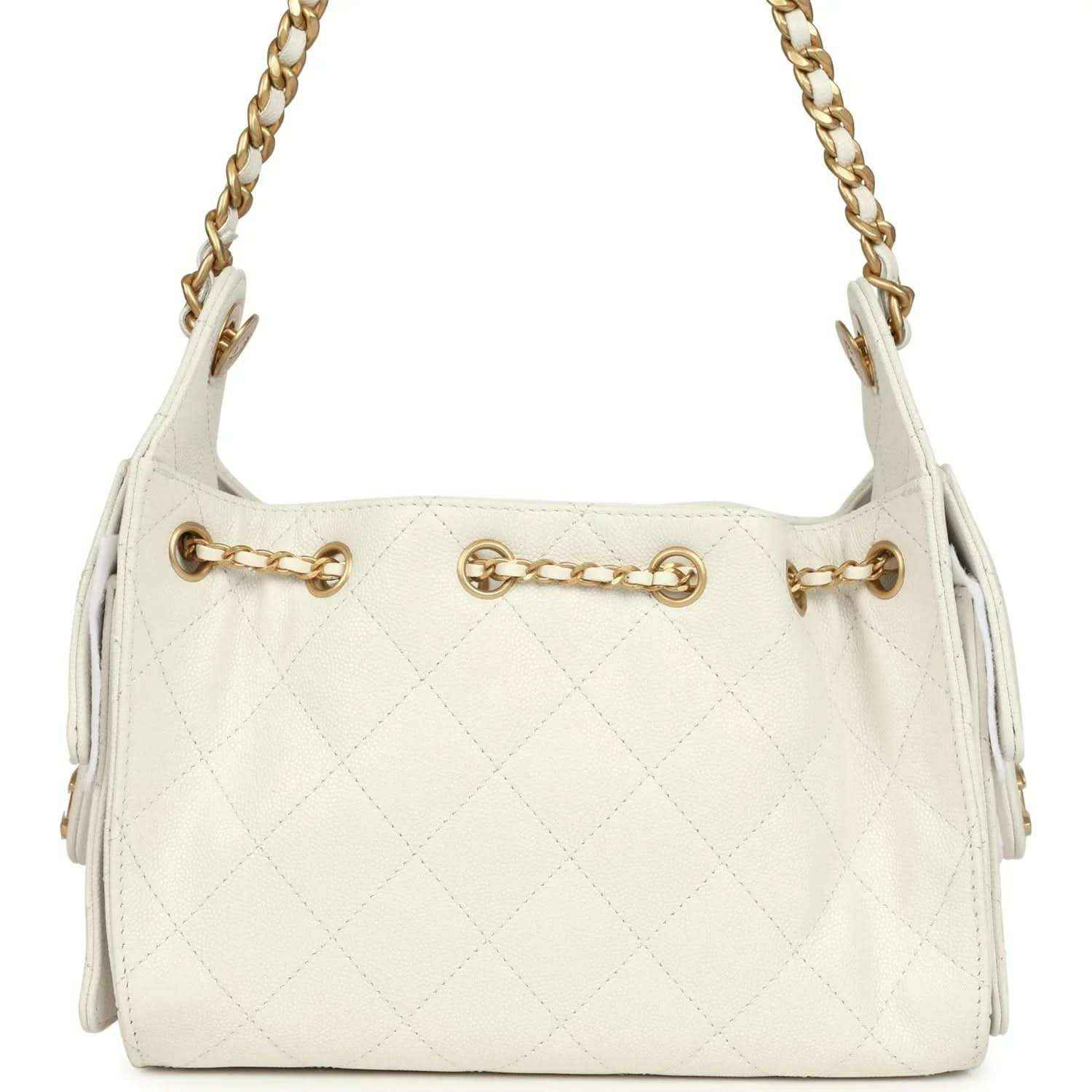 Chanel mini hobo bag in white quilted leather with antique gold chain strap and front tab clasp