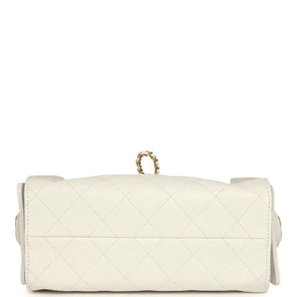 White quilted leather mini hobo bag with top flap and small ring for the gold chain strap