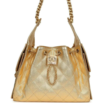 Metallic gold quilted hobo bag with chain handles and top clasp