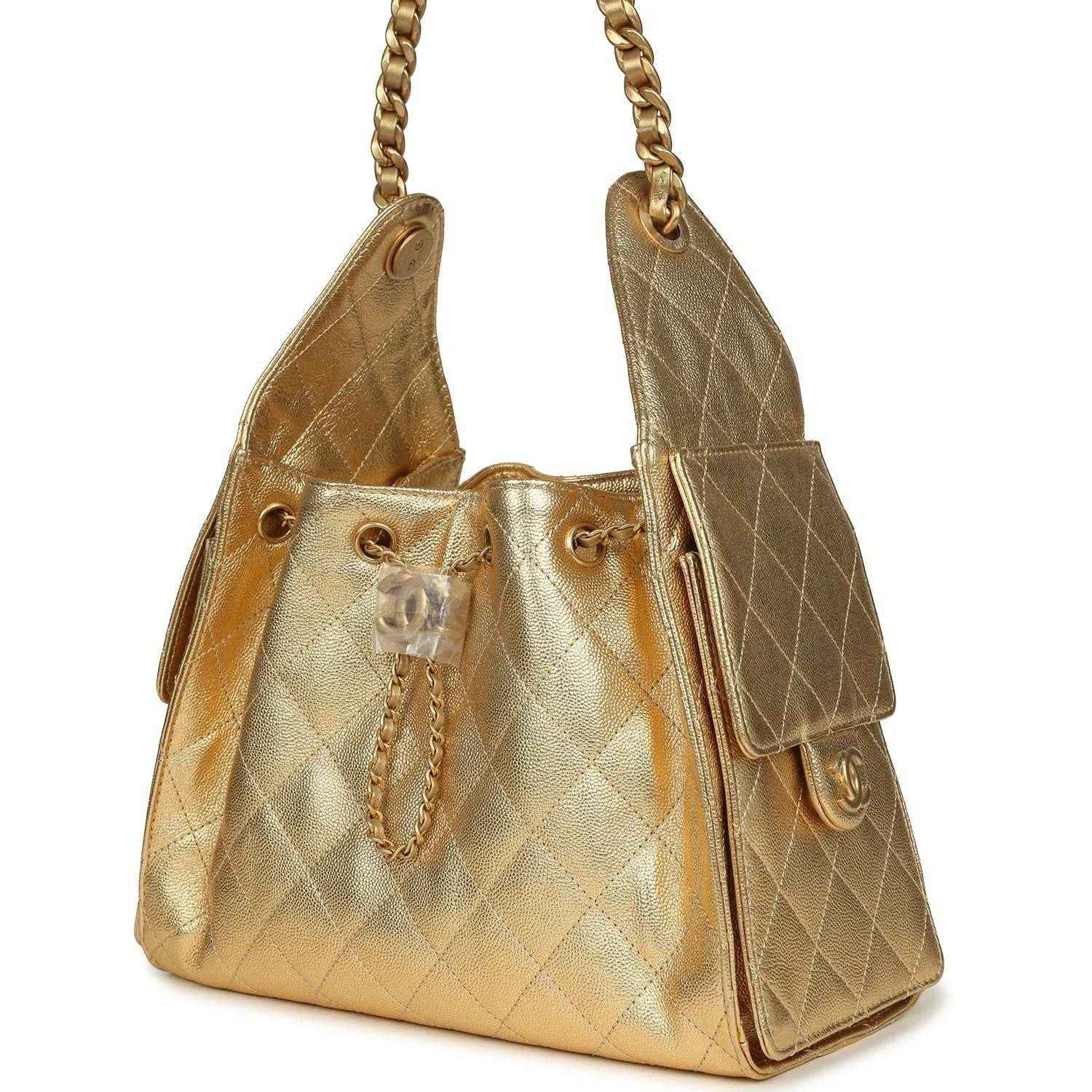 Metallic gold quilted hobo bag with chain straps and side pocket details