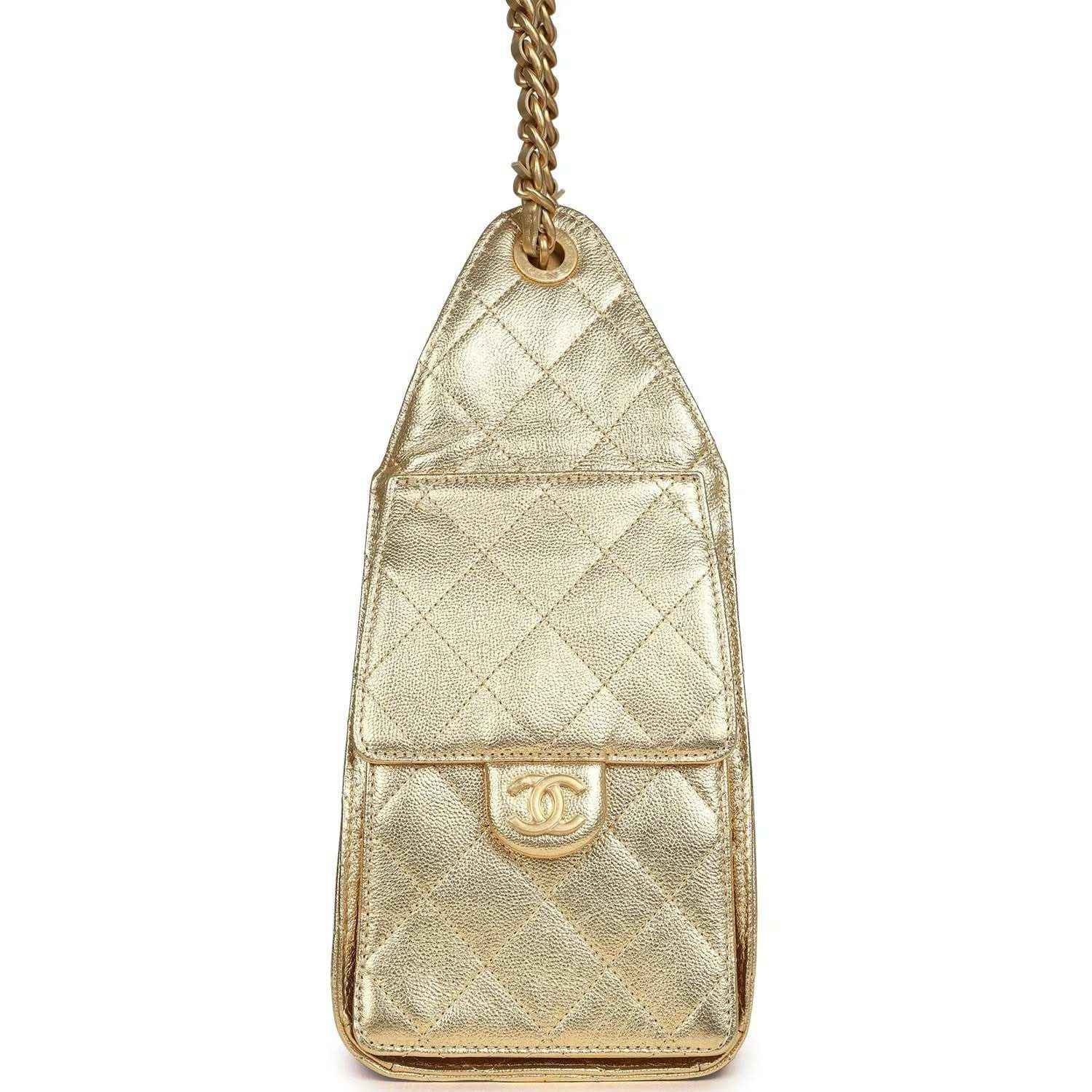 Metallic gold small hobo bag with quilted front panel and gold clasp