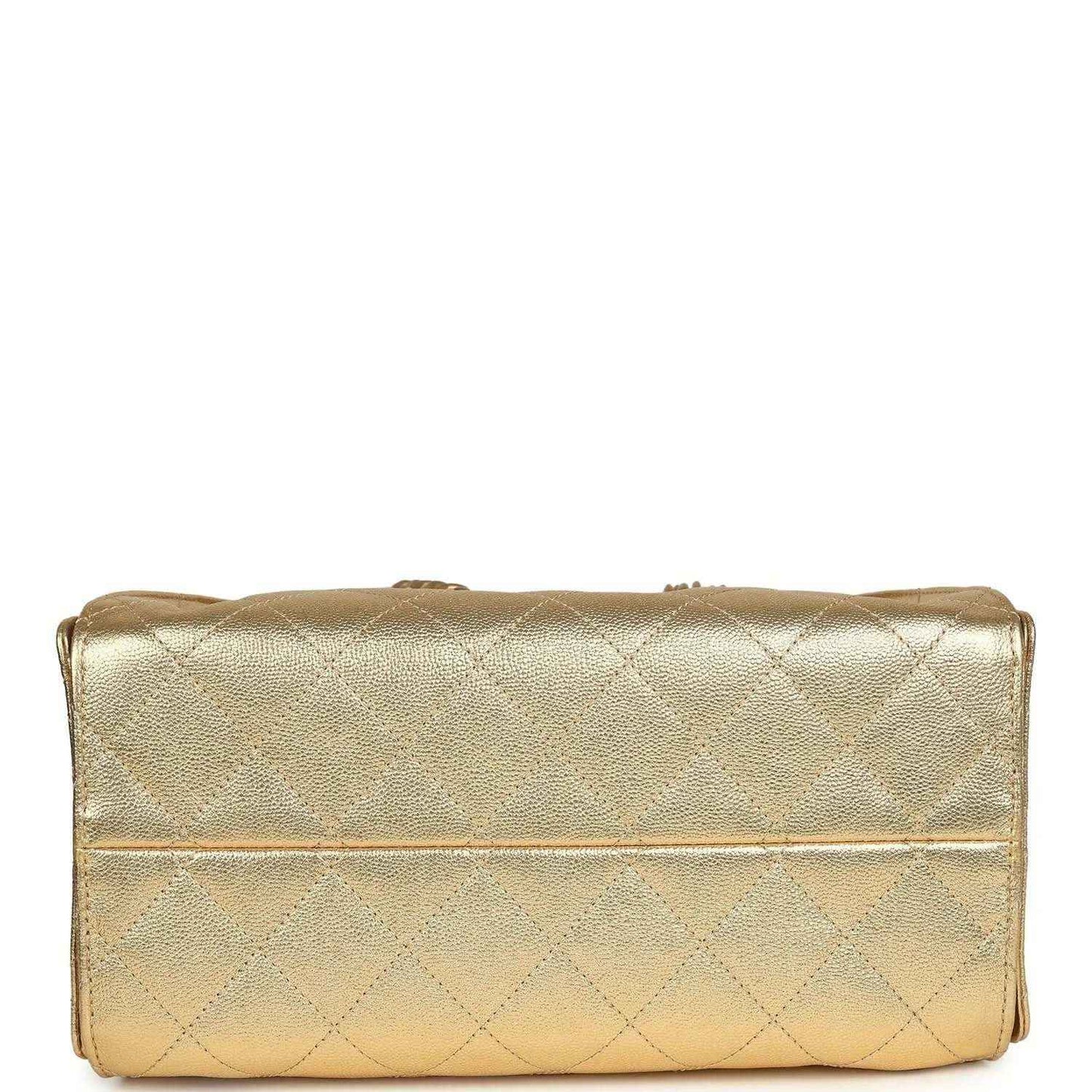 Metallic gold quilted hobo bag bottom with top fold and stitched seam