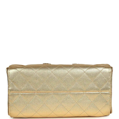 Metallic gold quilted hobo bag bottom with top fold and stitched seam