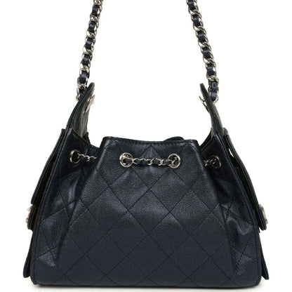 Chanel Mini 25 hobo bag front view in dark blue quilted caviar with chain handle