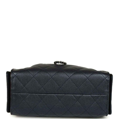 Mini 25 hobo bag dark blue quilted leather with top handle and flap closure