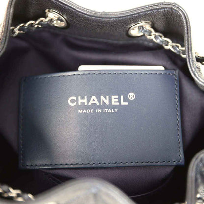 Chanel Mini 25 hobo bag interior label reading CHANEL MADE IN ITALY