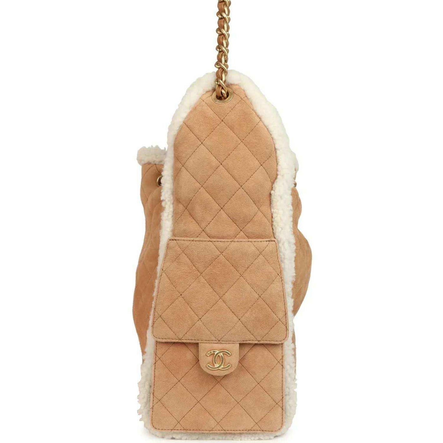 Beige suede mini hobo bag with white shearling lining and quilted back panel, gold chain