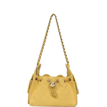 Chanel Mini 25 hobo bag, yellow quilted suede, CC clasp charm, hanging chain straps