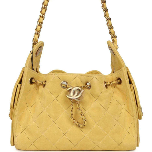 Chanel Mini 25 hobo bag, yellow quilted suede, antique gold hardware, chain strap