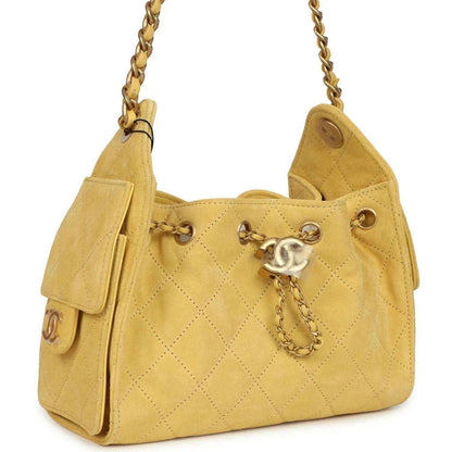 Chanel Mini 25 hobo bag, yellow quilted suede, CC clasp, antique gold chain strap