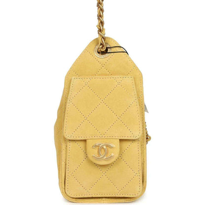 Chanel Mini 25 hobo bag, yellow quilted suede, back flap with CC logo, chain