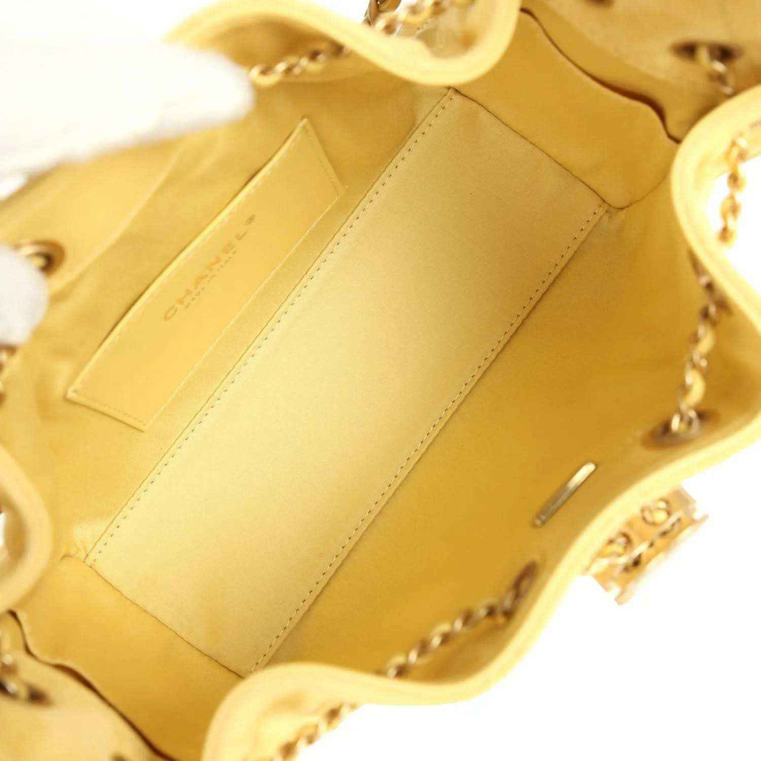 Chanel Mini 25 hobo bag interior, yellow suede lining with stitched card slot