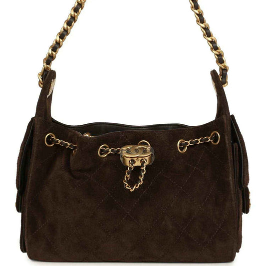 Dark brown suede mini hobo bag with antique gold chain, top clasp, and side rings.