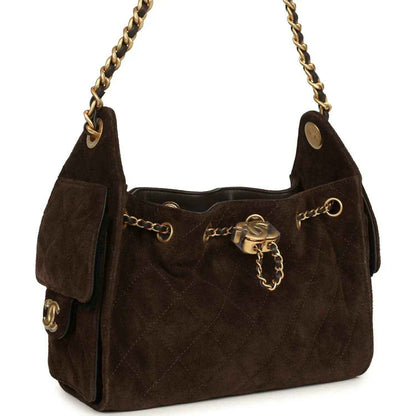 Dark brown suede mini hobo bag with braided chain handles and antique gold turn-lock clasp.