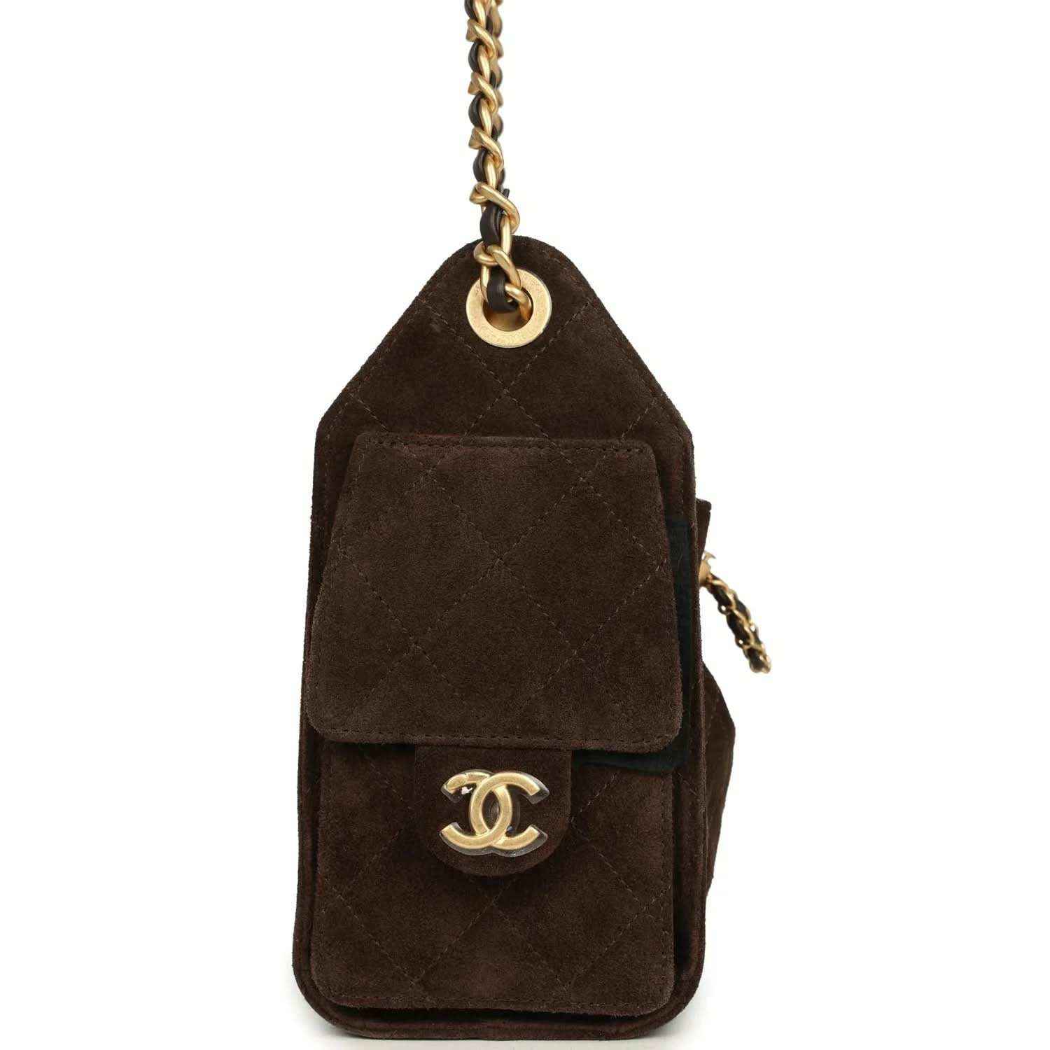 Dark brown suede mini bag charm with top loop and Chanel logo medallion in antique gold.