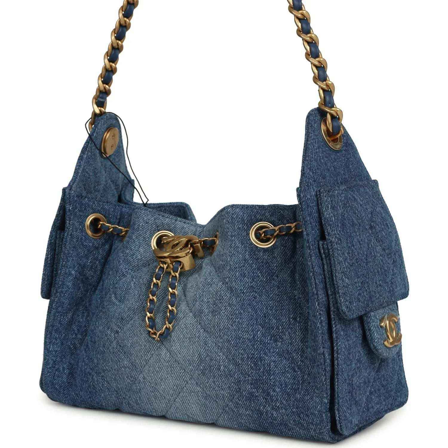 Blue washed denim mini hobo bag with chain strap, front drawcord detail, and side tassel