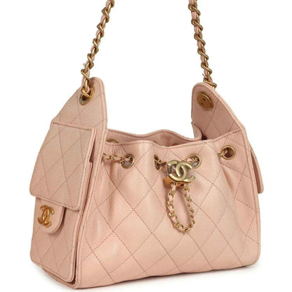Mini 25 hobo bag in pink quilted caviar with gold chain and side flap pocket
