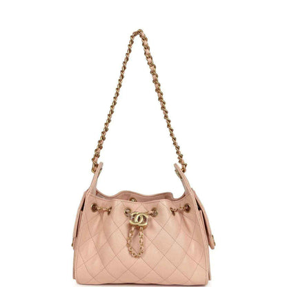 Mini 25 hobo bag in pink quilted caviar with rolled top and stitched diamond pattern