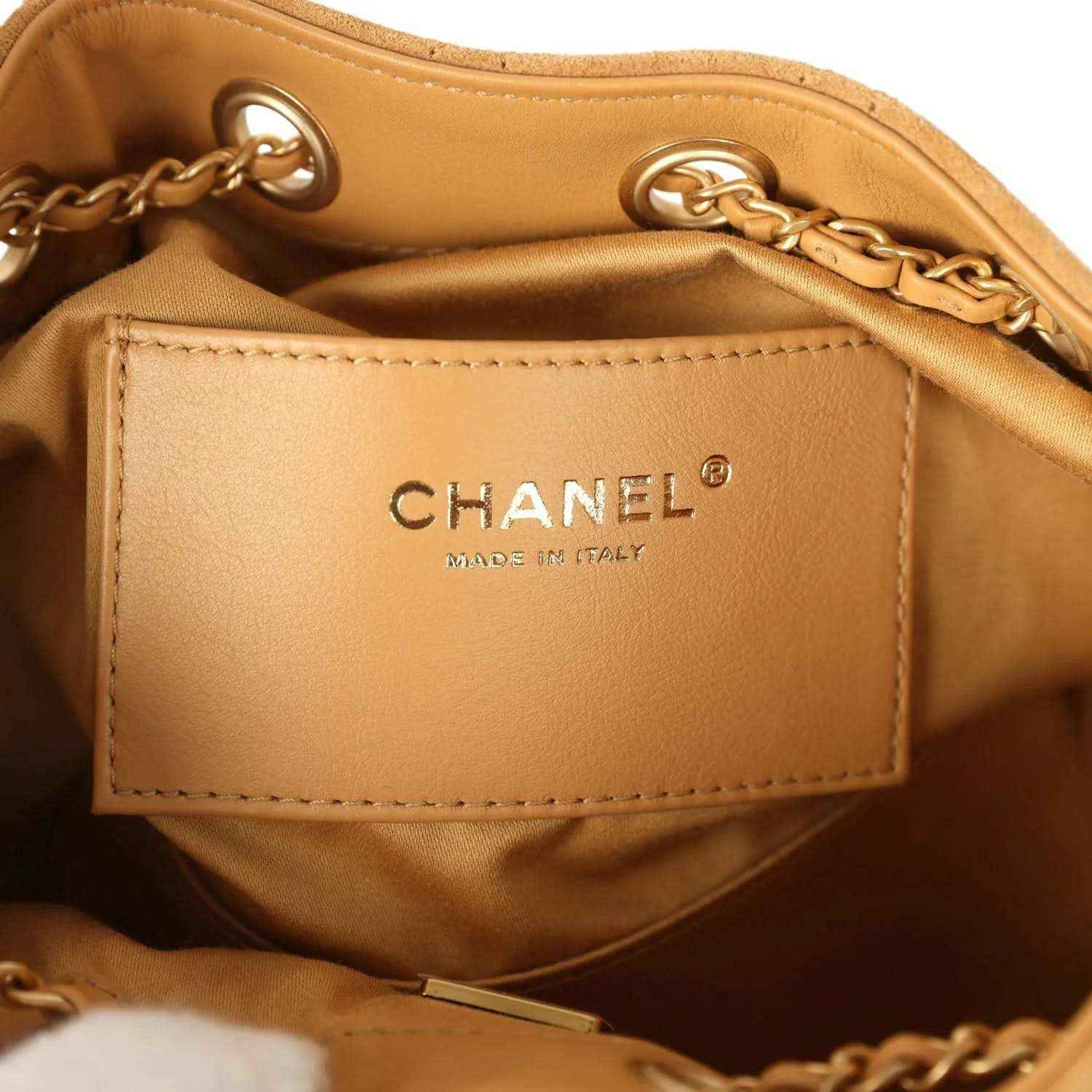 Chanel interior patch reading CHANEL and MADE IN ITALY on tan lining