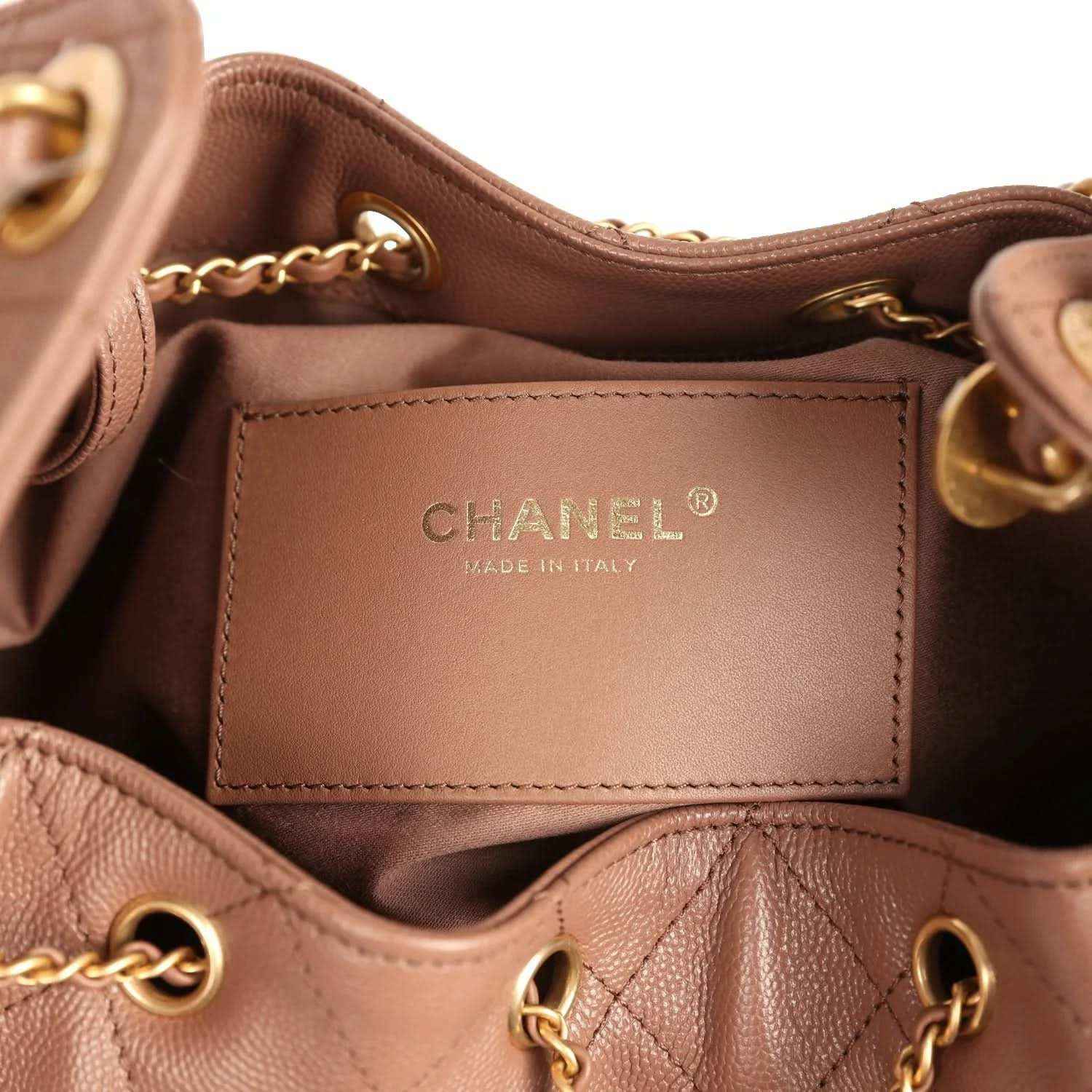 CHANEL leather interior label on brown bag lining