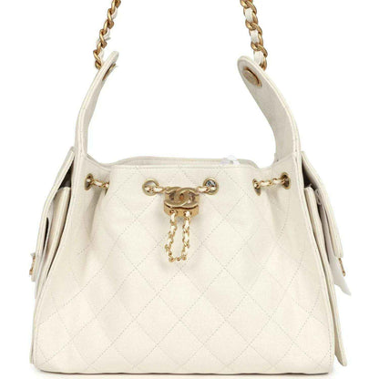 Chanel small quilted hobo bag in white with gold chain straps and CC emblem charm