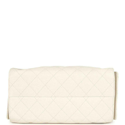 Chanel quilted hobo bag in white with fold-over back flap and stitched panel