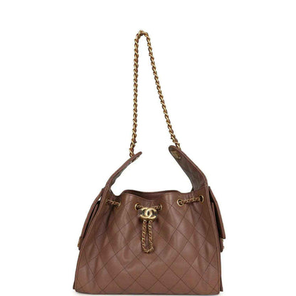 Brown quilted caviar hobo bag with gold chain strap and CC charm