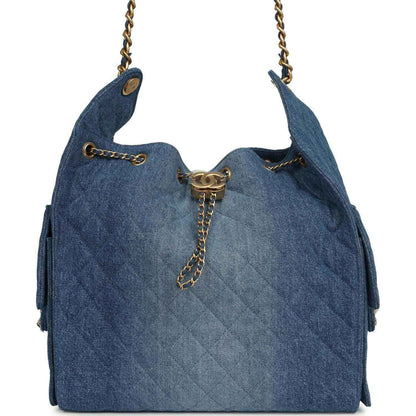 Chanel Medium 25 hobo bag in blue washed denim with antique gold-tone hardware