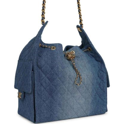 Chanel Medium 25 hobo bag, blue washed denim with quilted texture and chain strap