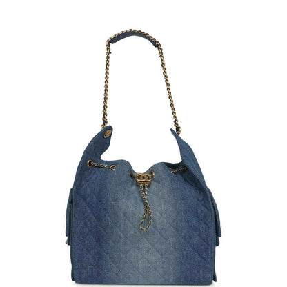 Chanel Medium 25 hobo bag with rounded top and chain handles in blue washed denim