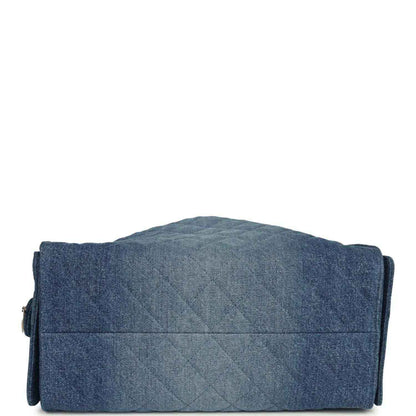 Chanel Medium 25 hobo bag back view in blue washed denim with horizontal seam