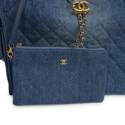 Chanel Medium 25 hobo bag front pouch pocket in blue washed denim with CC logo